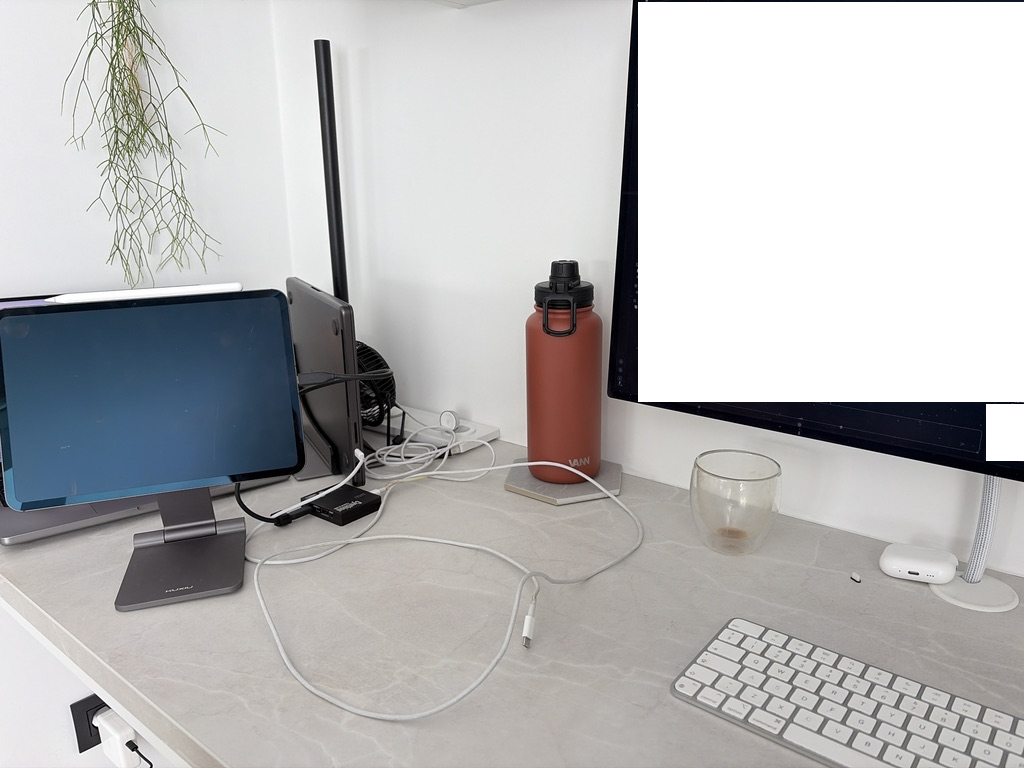 A stock external iPad wired up as the victim device on my desk